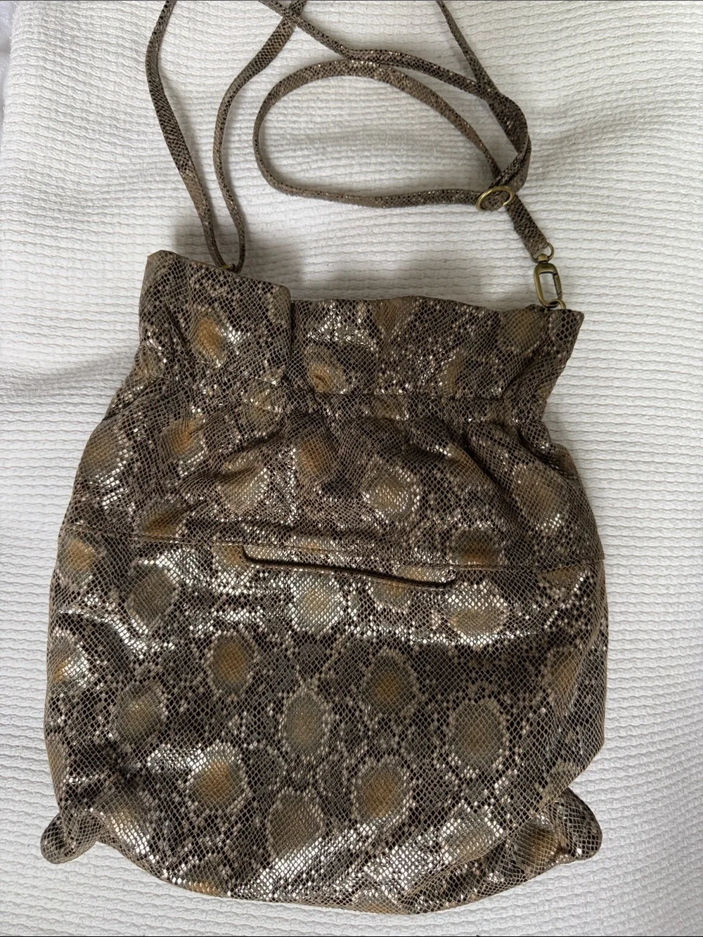 HOBO Brown Metallic Drawstring Shoulder Bag with Gold Accents